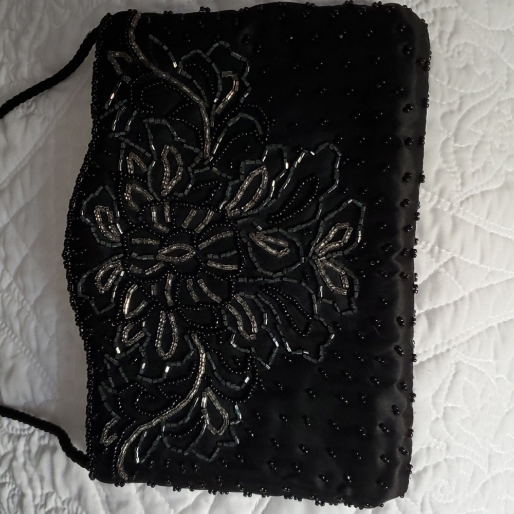 La regale black beaded satin bag